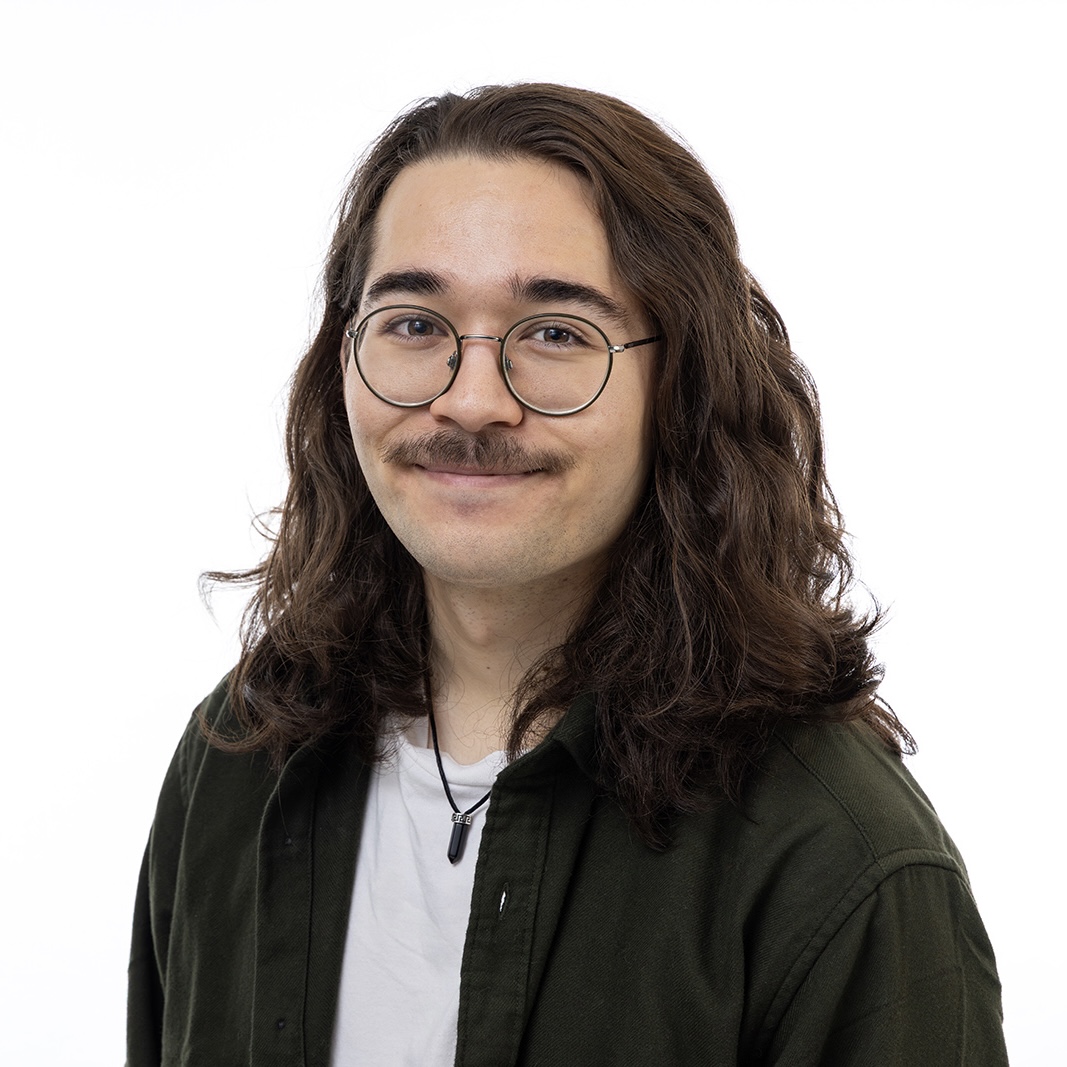 Picture of me from a couple years ago, when I had shorter hair and a light beard
